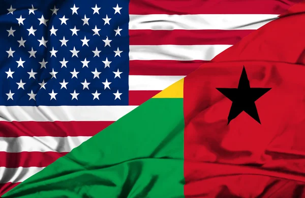 Waving flag of Guinea Bissau and USA — Stock Photo, Image