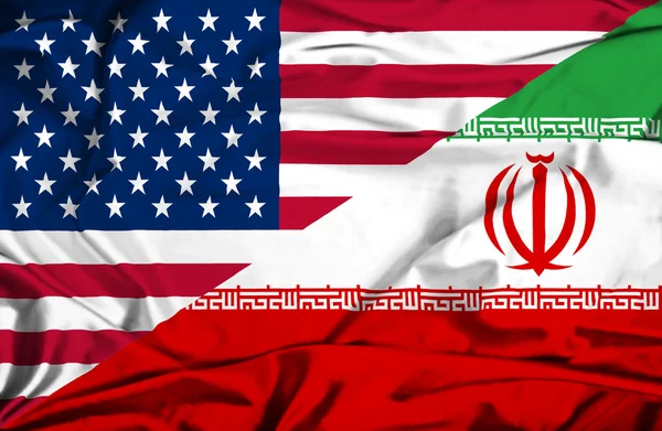 伊朗和美国那飘扬的旗帜 — 图库照片