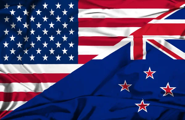 Bandera ondeante de Nueva Zelanda y Estados Unidos — Foto de Stock