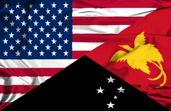 Waving flag of Papua New Guinea and USA — Stock Photo, Image