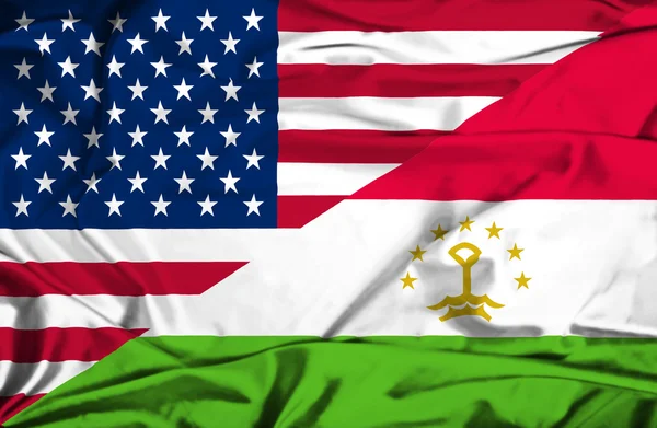 那飘扬的旗帜，塔吉克斯坦和美国 — 图库照片