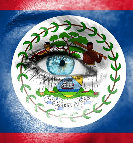 Woman face painted with flag of Belize — Stock Photo, Image