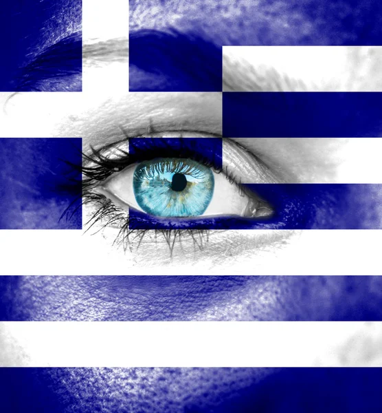 Woman face painted with flag of Greece — Stock Photo, Image