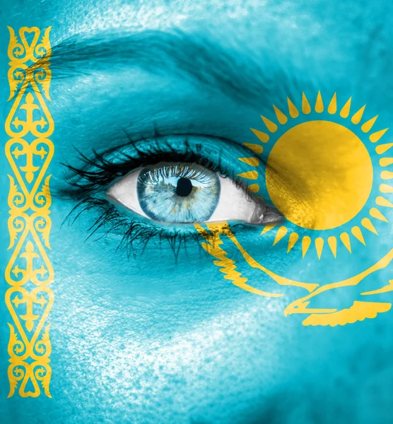 Woman face painted with flag of Kazakhstan — Stock Photo, Image