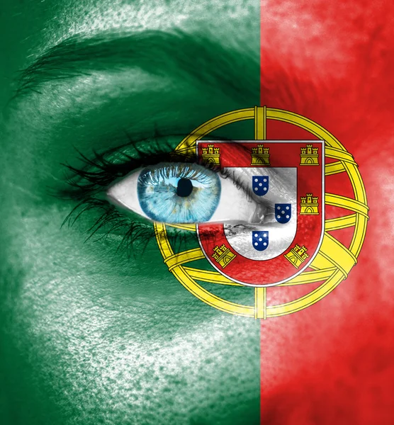 Woman face painted with flag of Portugal — Stock Photo, Image