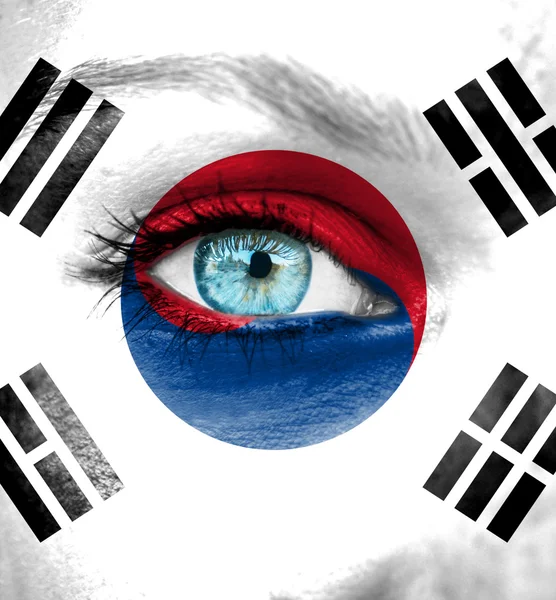 Woman face painted with flag of South Korea — Stock Photo, Image