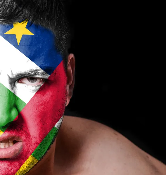 Portrait of angry man with painted flag of Central African Repub — Stock Photo, Image