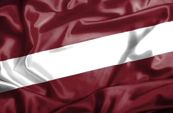 Letonya dalgalanan bayrak — Stok fotoğraf