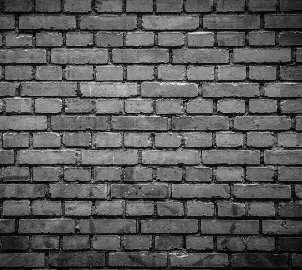 Dunkler Backsteinmauerhintergrund — Stockfoto