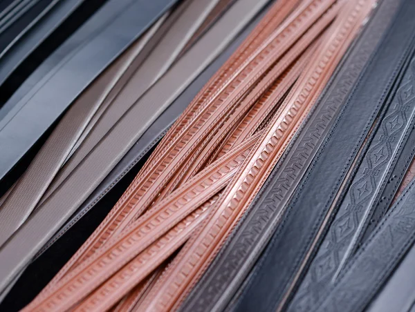 Leather belts background — Stock Photo, Image