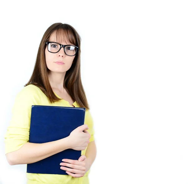 Felice giovane studente donne che tengono libri in mano mentre standi — Foto Stock