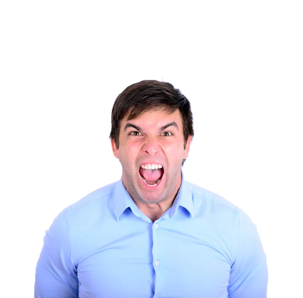 Portrait of angry young man looking straight forward and shoutin — Stock Photo, Image