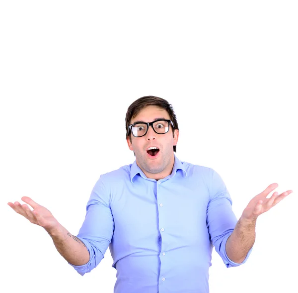 Portrait of confused clueless young man against white background — Stock Photo, Image