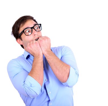 Portrait of scared young businessman or manager biting his nails clipart