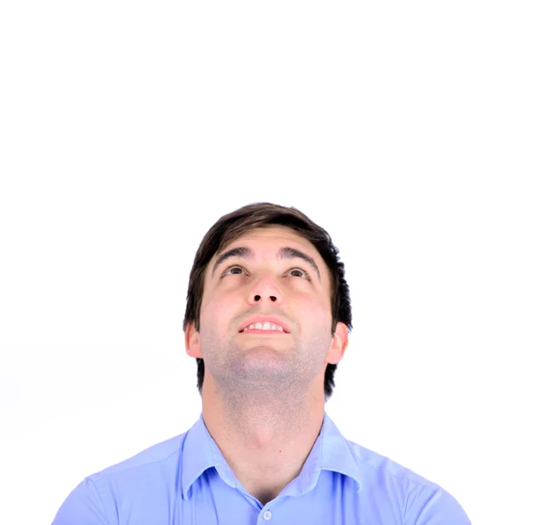 Retrato de jovem bonito sorridente olhando acima isolado o — Fotografia de Stock