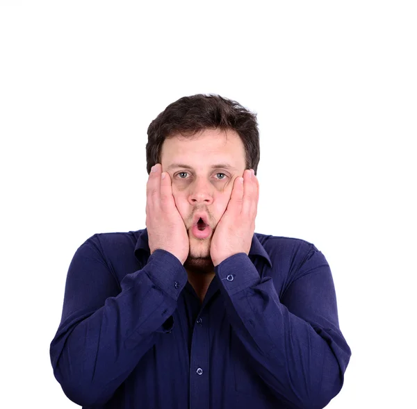 Portrait of young man in shock or under great pressure isolated — Stock Photo, Image