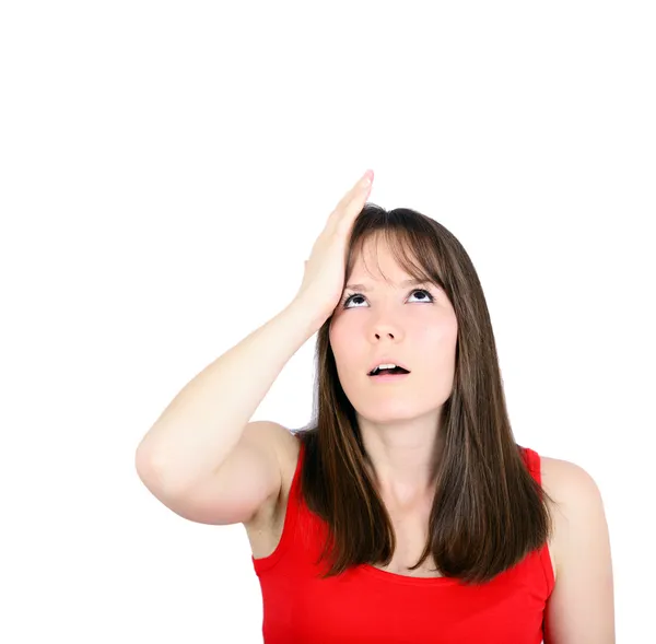 Portrait of young woman slapping hand on head having a duh momen — Stock Photo, Image