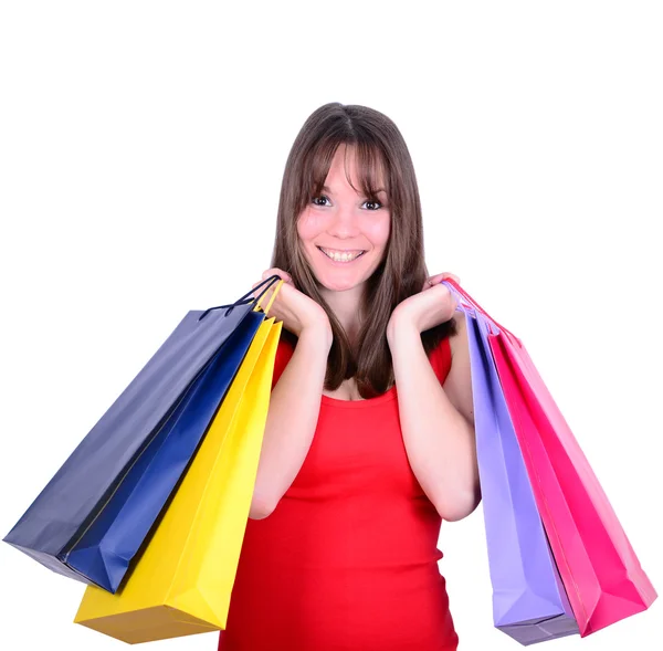 Młoda piękna kobieta zakupy na sprzedaż gospodarstwa wiele kolorowych sho — Zdjęcie stockowe