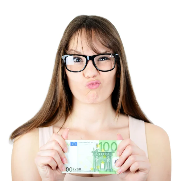 Schöne Frau mit einem Euro-Schein in der Hand und lustigem Blick lizenzfreie Stockbilder