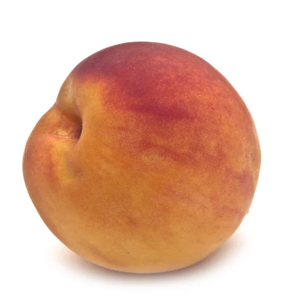 Bright peach close-up on white background — Stock Photo, Image