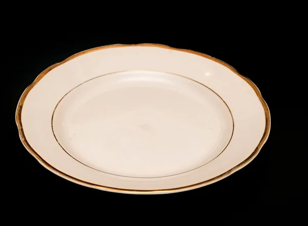 Plate on black background — Stock Photo, Image