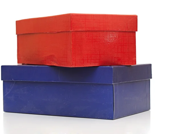 Old blue and red gift boxes on white — Stock Photo, Image