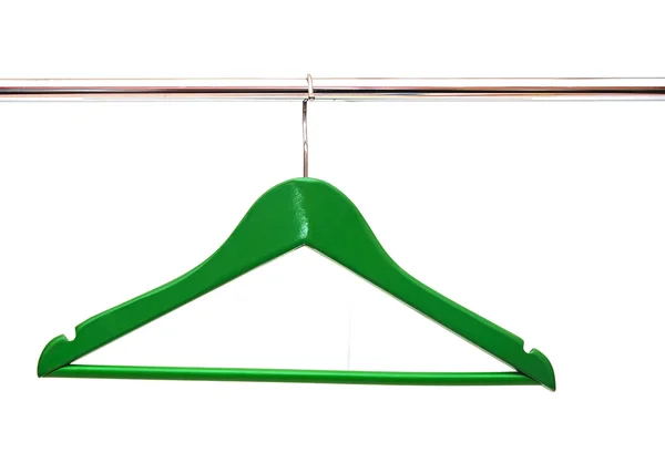 Close up of green cloth hangers in row on white background — Stock Photo, Image