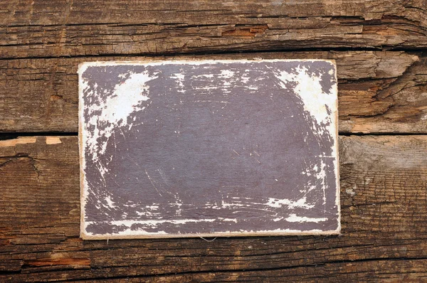 Old paper put on the old wood — Stock Photo, Image