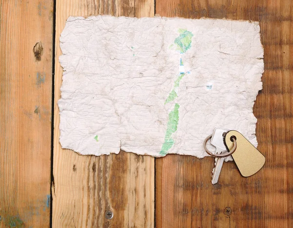 Old paper and key with space for text — Stock Photo, Image