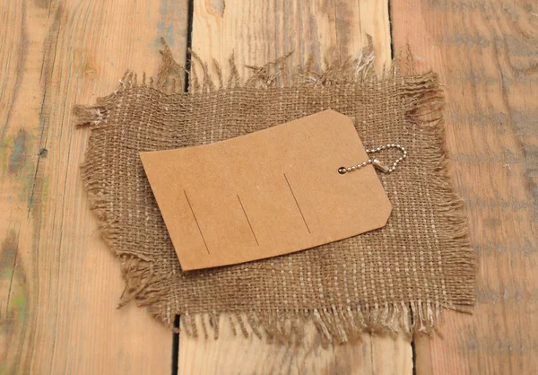 Sack burlap background texture and price tag — Stock Photo, Image