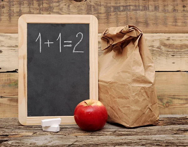 School lunch over blank blackboard — Stock Photo, Image