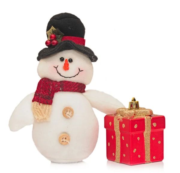 Снеговик и новогодняя подарочная коробка — стоковое фото