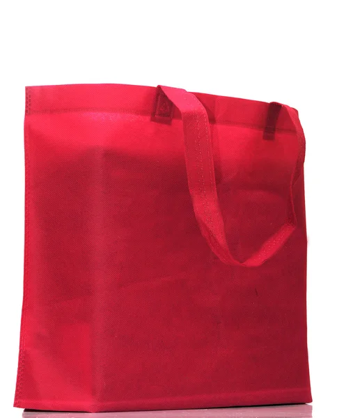 Bolsa roja en el blanco —  Fotos de Stock