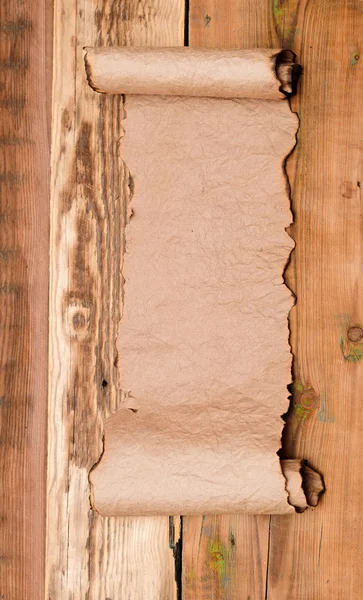 Pusty stary przewijania na drewnianym stole — Zdjęcie stockowe