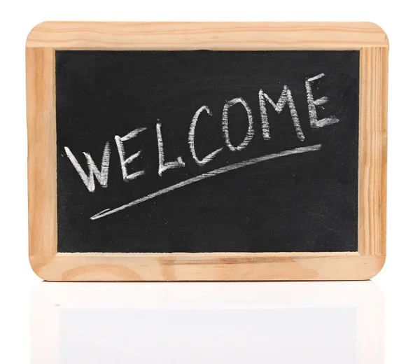 Palabra "bienvenida" - caligrafía de tiza blanca en la pequeña escuela de madera —  Fotos de Stock