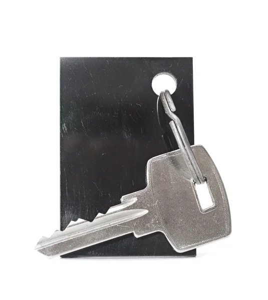 Blank tag and a key isolated on white background — Stock Photo, Image