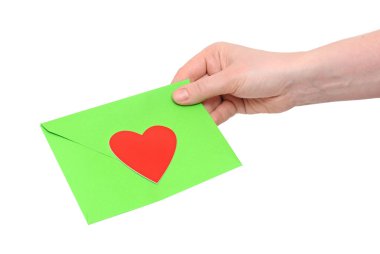 hands with letter - green envelope and red heart isolated on whi