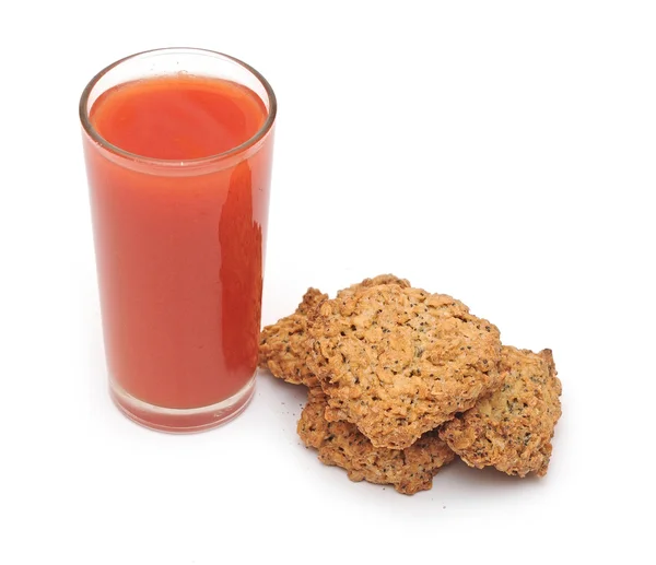 Tomato juice glass with cookies isolated on white background — Stock Photo, Image