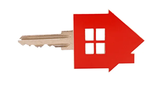 Beyaz arkaplanda ev anahtarı — Stok fotoğraf
