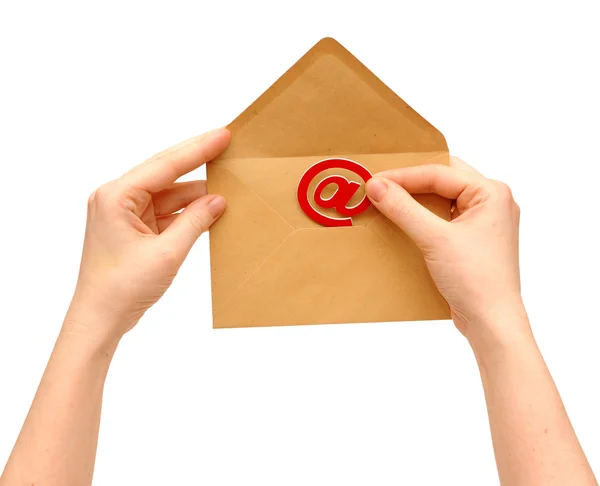 Envelope and e-mail in the hands of women — Stock Photo, Image