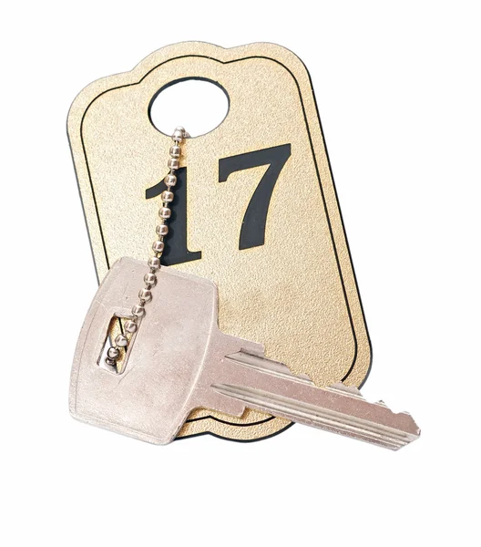 Room key from a hotel with a number — Stock Photo, Image