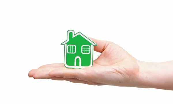 Hand holding green house icon — Stock Photo, Image