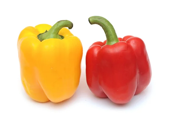 Fresh yellow and red bell peppers isolated on white — Stock Photo, Image
