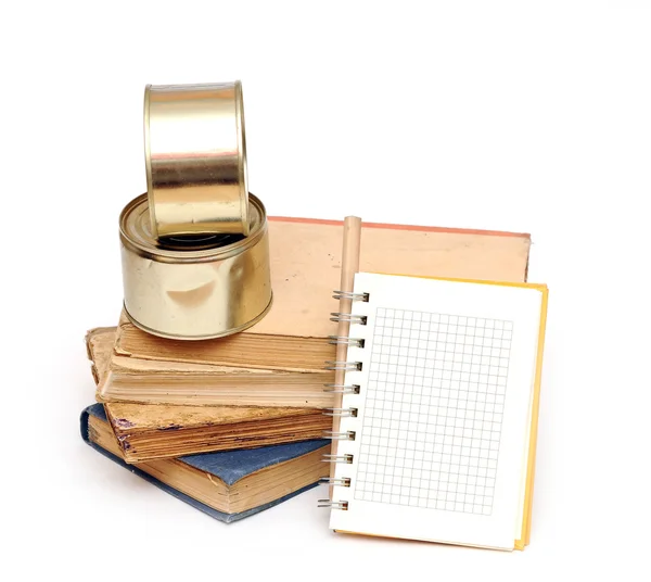 Pencil on notebook near pile of books on white — Stock Photo, Image