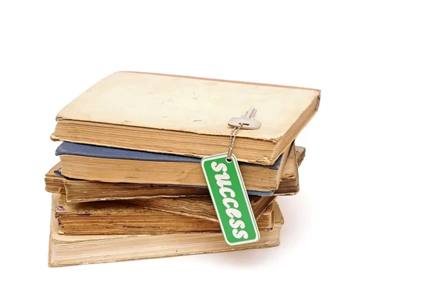 Pile book with a key to success — Stock Photo, Image