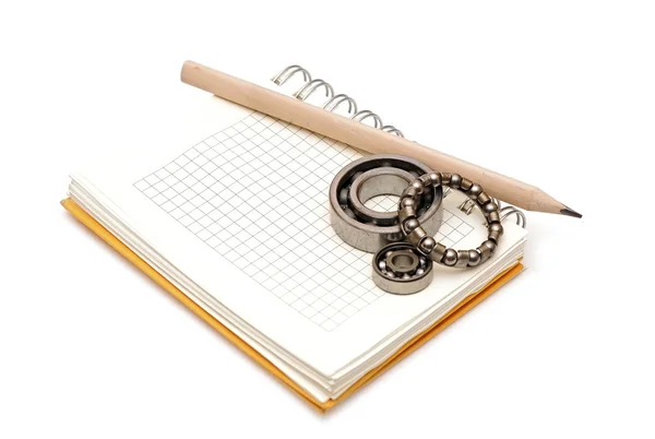 Bearings on the blank notebook. copy space for your text — Stock Photo, Image