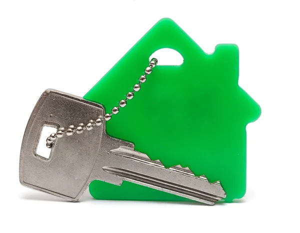 Huis sleutels en sleutelhanger op witte achtergrond — Stockfoto