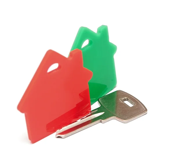 Immobili rossi e verdi, icona della casa, isolati su sfondo bianco — Foto Stock