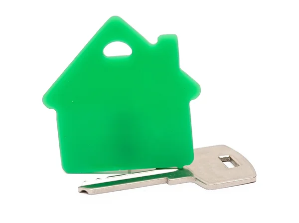 Silver key with house figure on the white background — Stock Photo, Image