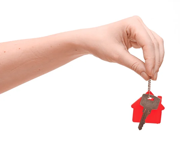 Hand is handing a house key — Stock Photo, Image